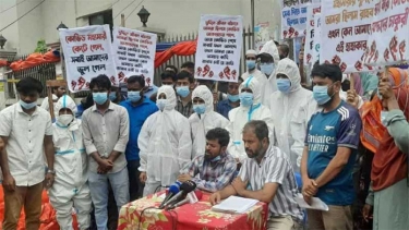 চাকরি স্থায়ীকরণসহ দুই দাবিতে ইআরপিপি প্রকল্পে কর্মরতদের মানববন্ধন