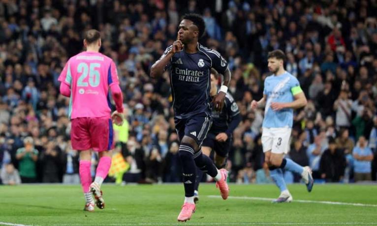 ভিনিসিয়ুসের জোড়া গোলে সিটির স্বপ্ন ভেঙে কোয়ার্টারে রিয়াল